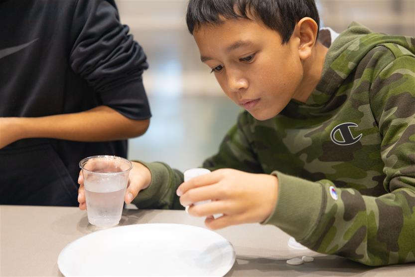 Students do a STEM challenge in class